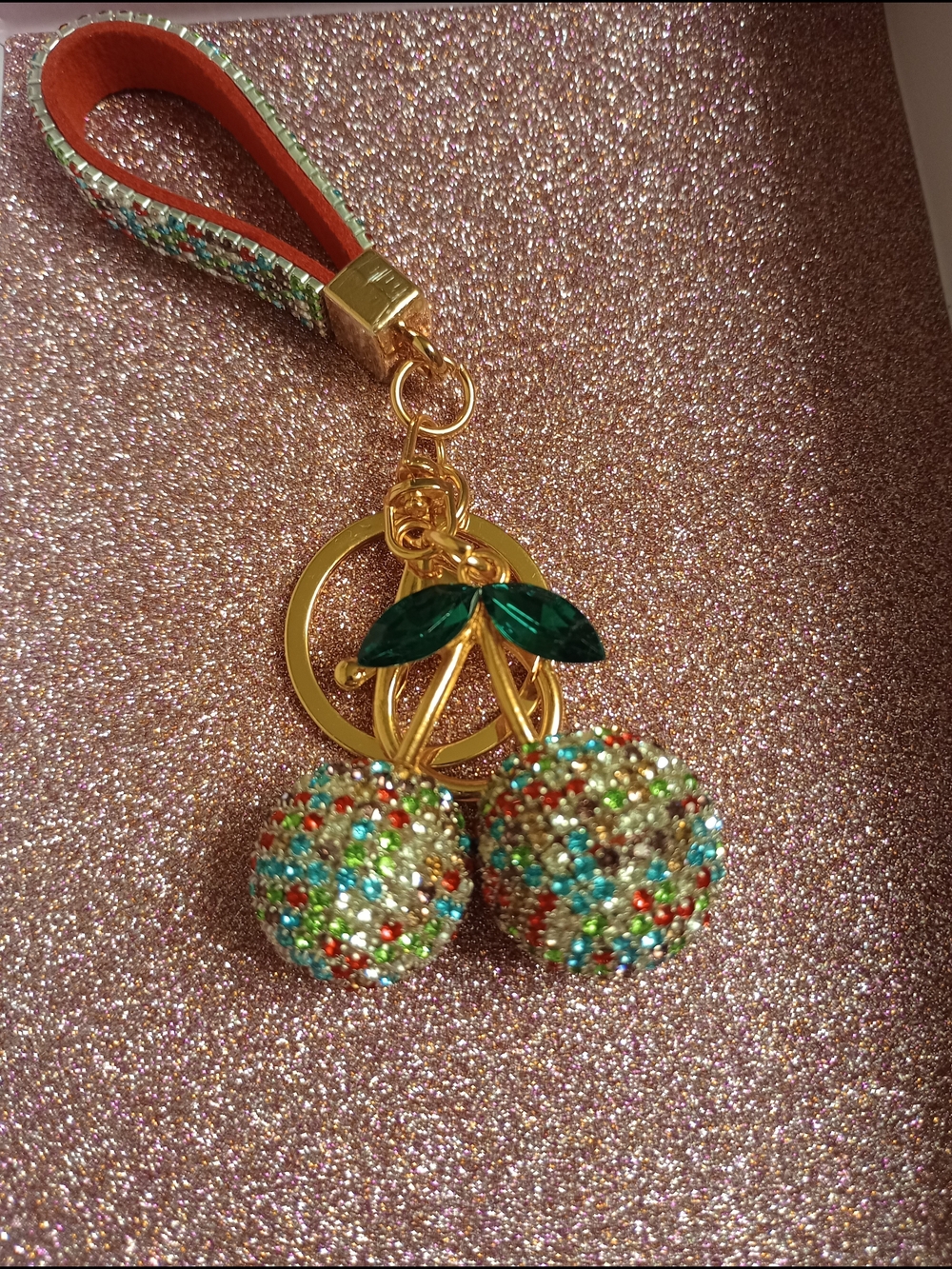 Crystal Cherry Charm Keychain with Green Leaf Accents